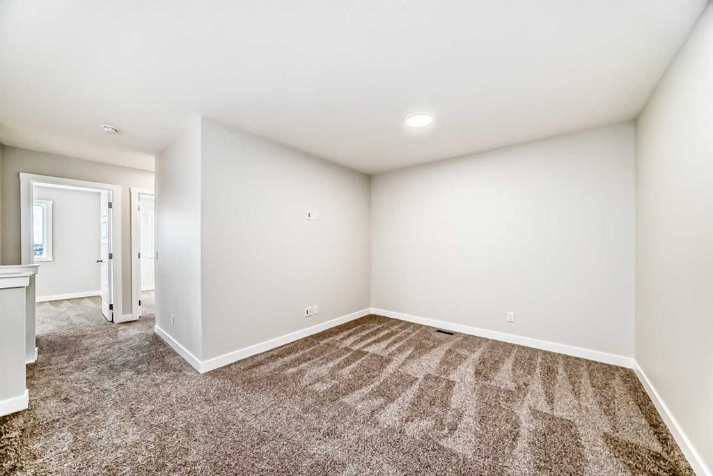 241 Bridgeport Gate, Chestermere, AB - Indoor Photo Showing Other Room
