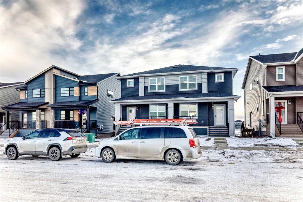 241 Bridgeport Gate, Chestermere, AB - Outdoor With Facade