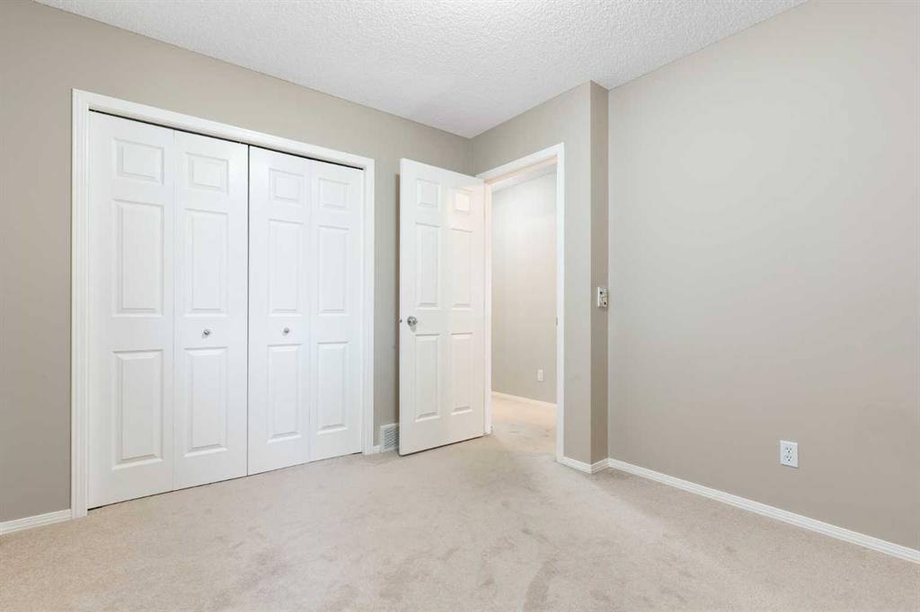 129 Evansbrooke Way Nw, Calgary, AB - Indoor Photo Showing Other Room