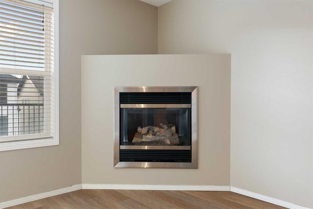 129 Evansbrooke Way Nw, Calgary, AB - Indoor With Fireplace