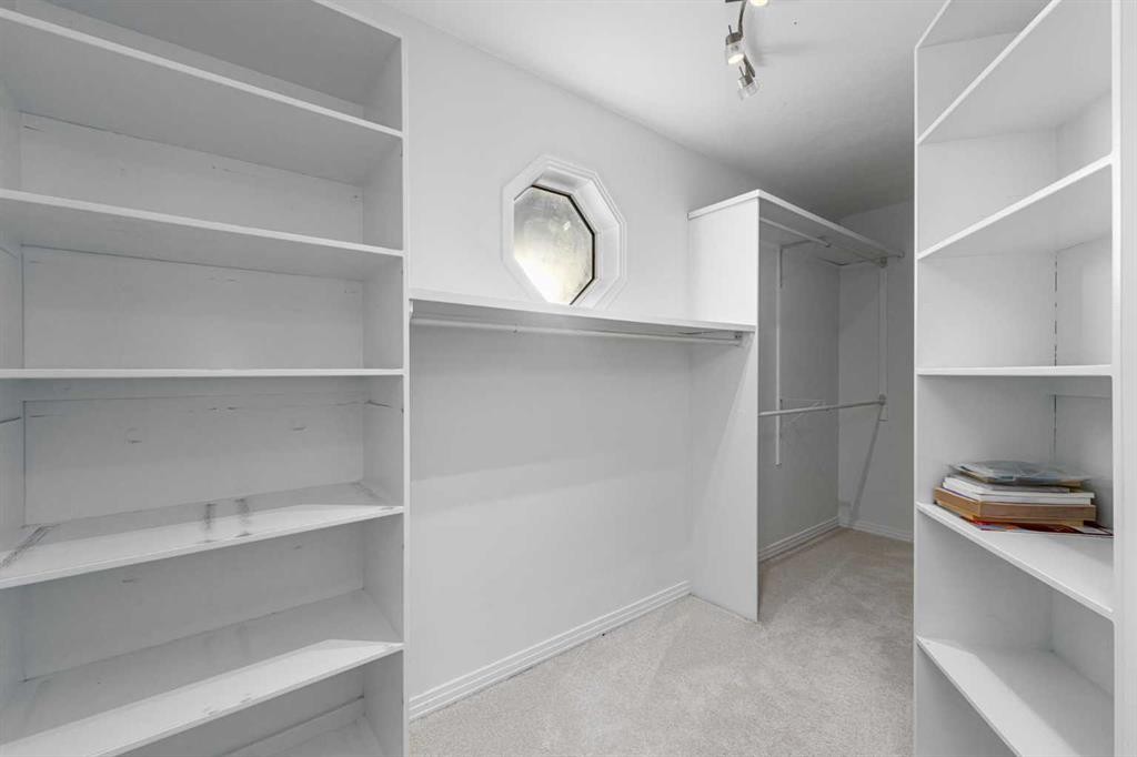 5503 Strathcona Hill Sw, Calgary, AB - Indoor With Storage
