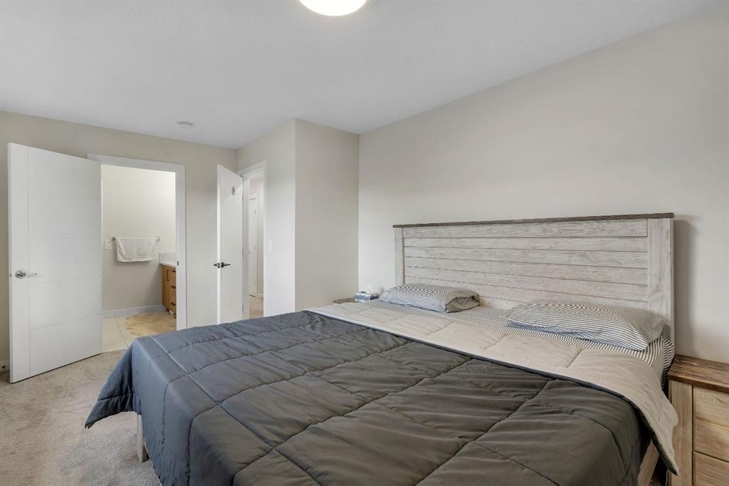 1222 Westmount Drive, Strathmore, AB - Indoor Photo Showing Bedroom