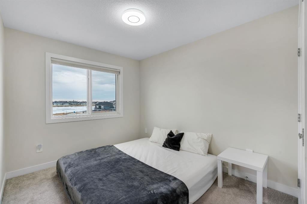 1222 Westmount Drive, Strathmore, AB - Indoor Photo Showing Bedroom
