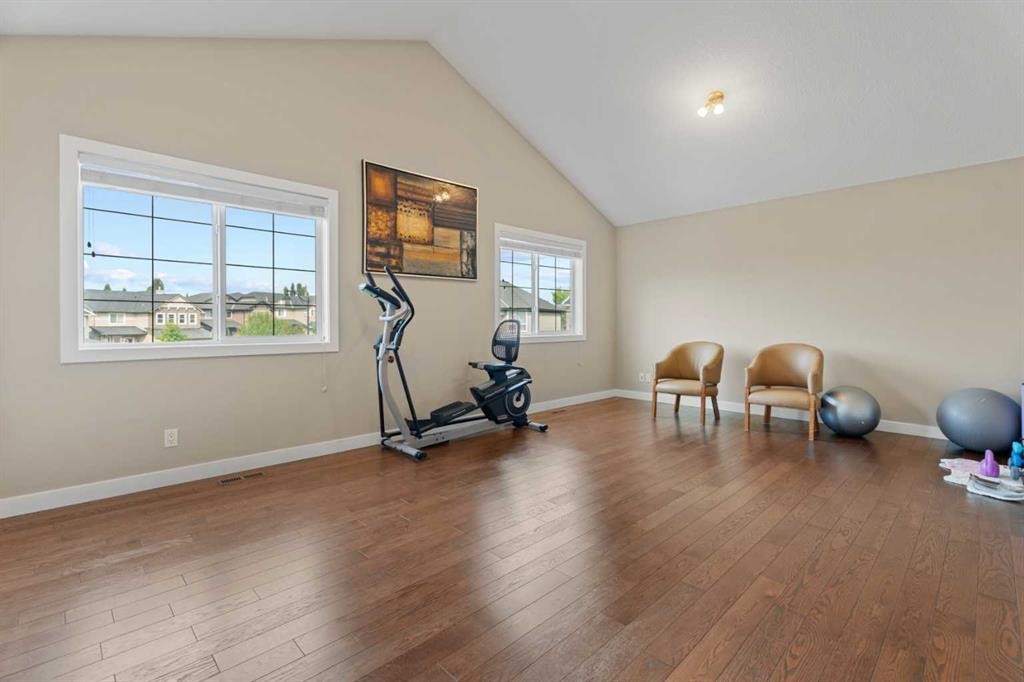 113 Aspen Stone Place Sw, Calgary, AB - Indoor Photo Showing Gym Room