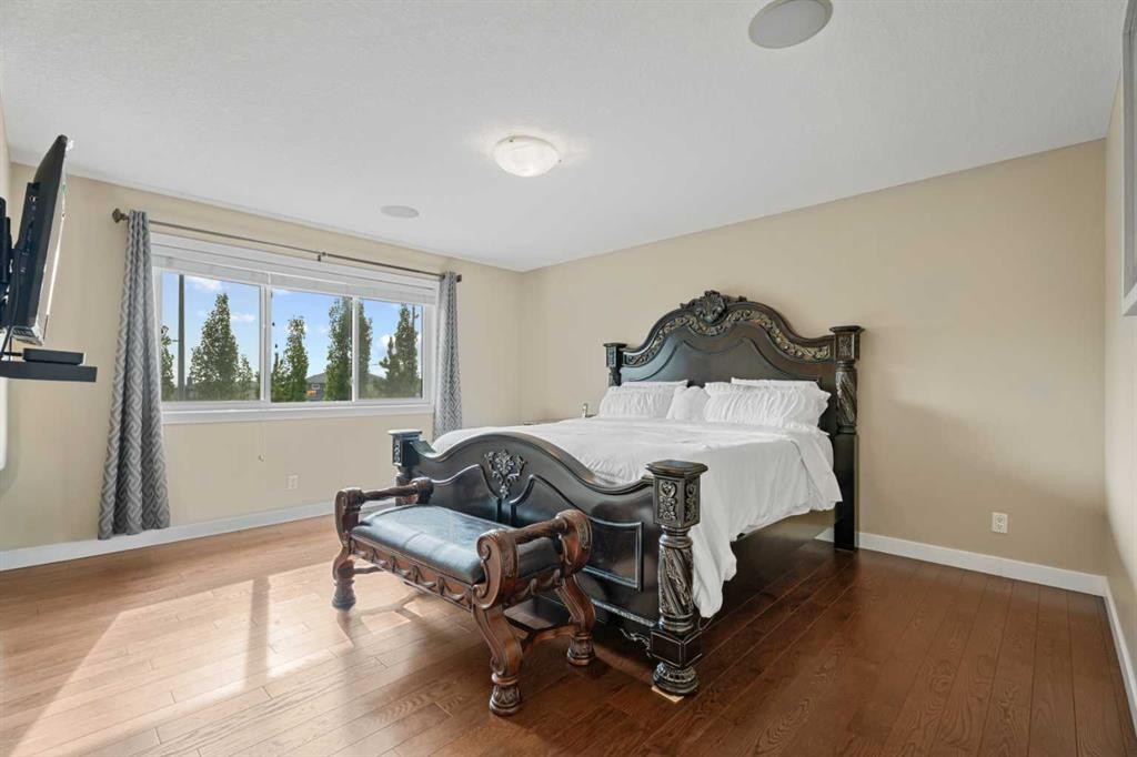 113 Aspen Stone Place Sw, Calgary, AB - Indoor Photo Showing Bedroom
