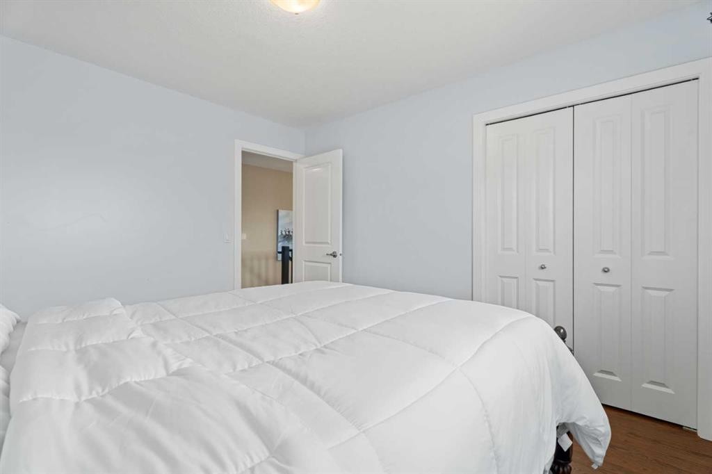 113 Aspen Stone Place Sw, Calgary, AB - Indoor Photo Showing Bedroom
