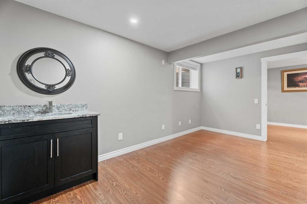 113 Aspen Stone Place Sw, Calgary, AB - Indoor Photo Showing Other Room