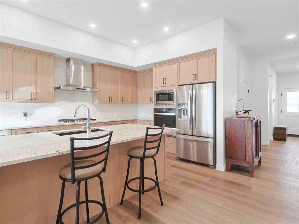 110 Sunstone Way, Balzac, AB - Indoor Photo Showing Kitchen
