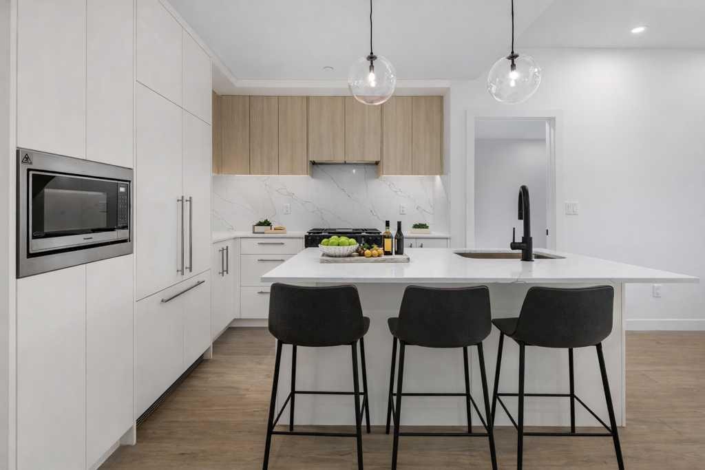 306-8375 Broadcast Avenue, Calgary, AB - Indoor Photo Showing Kitchen With Upgraded Kitchen