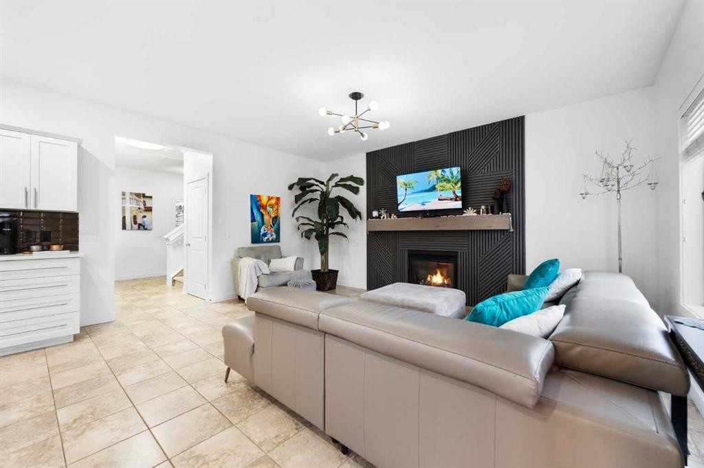 46 Autumn Circle Se, Calgary, AB - Indoor Photo Showing Living Room With Fireplace