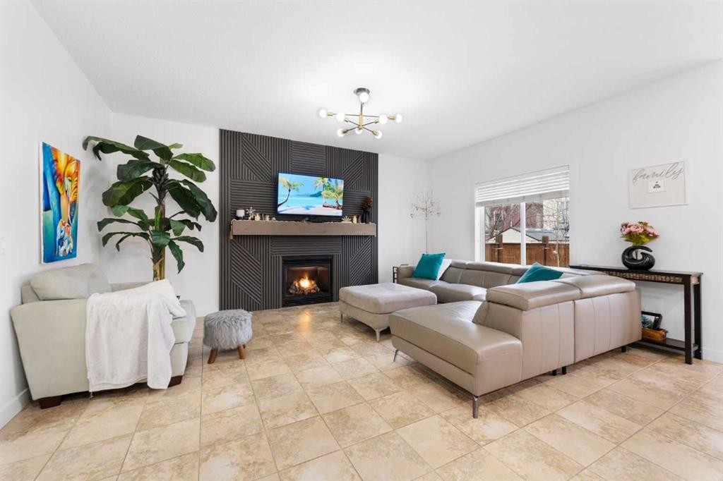 46 Autumn Circle Se, Calgary, AB - Indoor Photo Showing Living Room With Fireplace