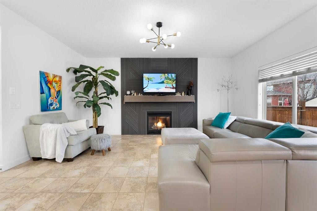 46 Autumn Circle Se, Calgary, AB - Indoor Photo Showing Living Room With Fireplace