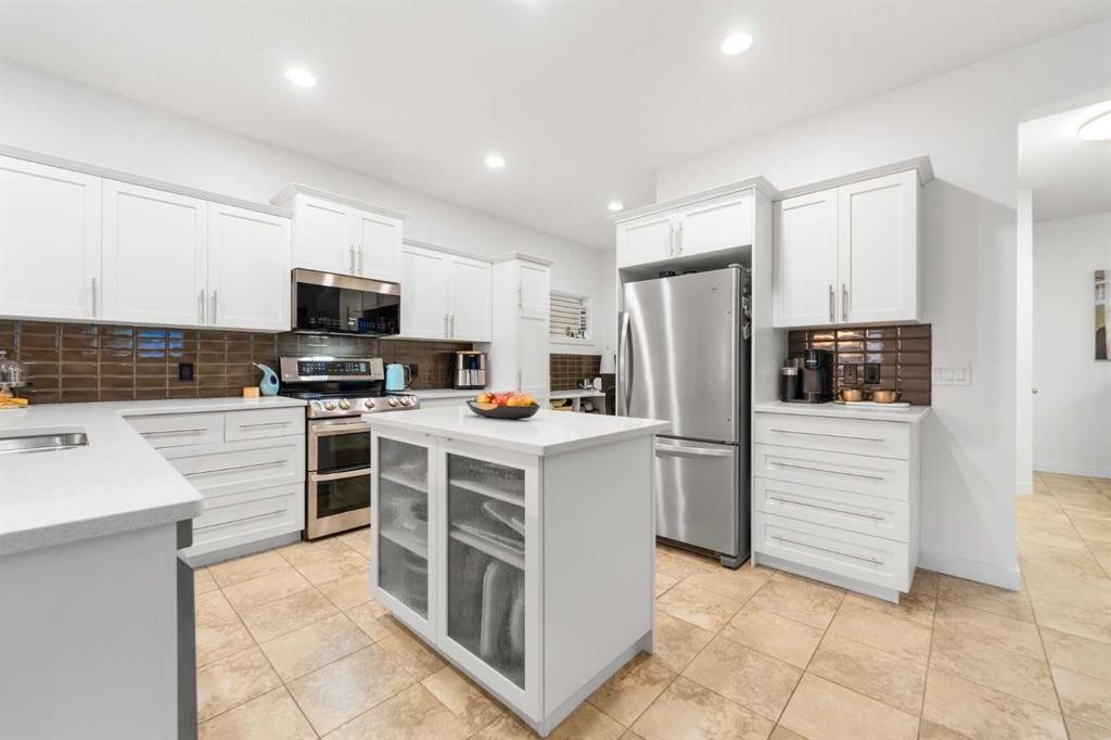 46 Autumn Circle Se, Calgary, AB - Indoor Photo Showing Kitchen With Stainless Steel Kitchen With Double Sink