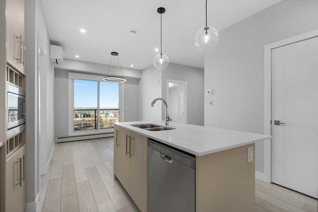 612-8230 Broadcast Avenue, Calgary, AB - Indoor Photo Showing Kitchen With Double Sink With Upgraded Kitchen