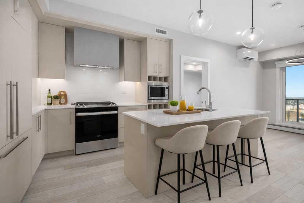 612-8230 Broadcast Avenue, Calgary, AB - Indoor Photo Showing Kitchen With Upgraded Kitchen