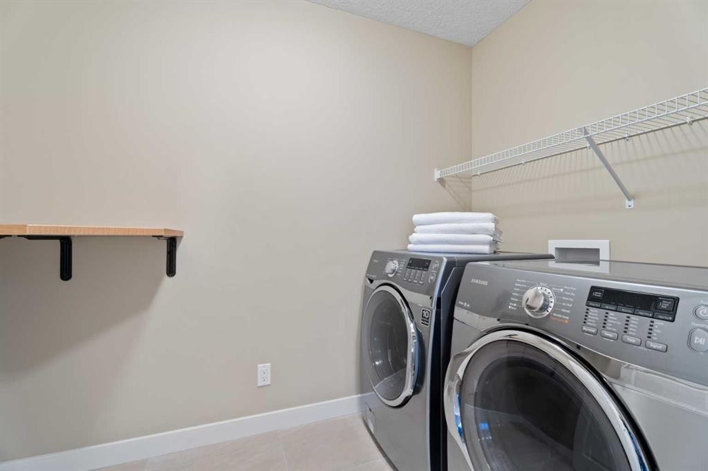 199 Cranarch Landing Se, Calgary, AB - Indoor Photo Showing Laundry Room