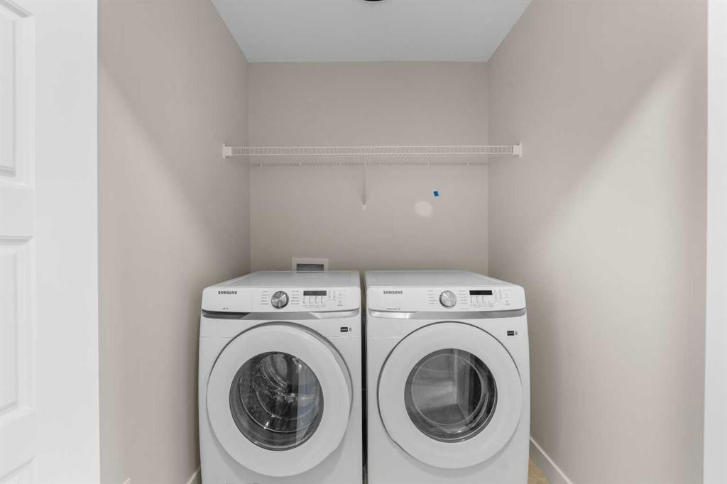 84 Buffaloberry Manor Se, Calgary, AB - Indoor Photo Showing Laundry Room
