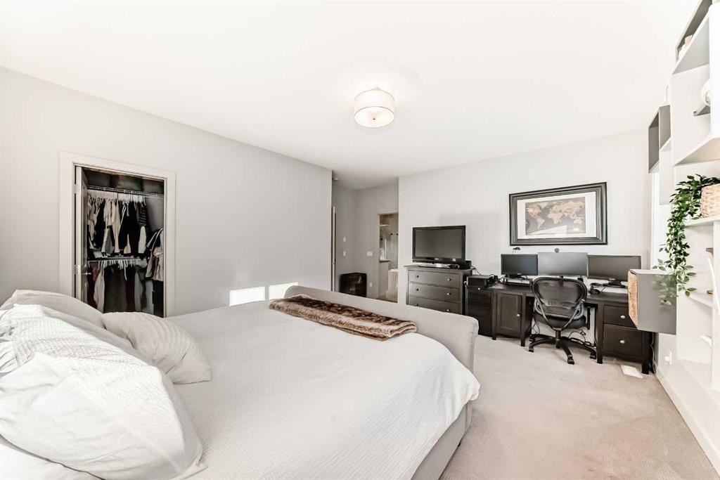 743 Shawnee Drive Sw, Calgary, AB - Indoor Photo Showing Bedroom