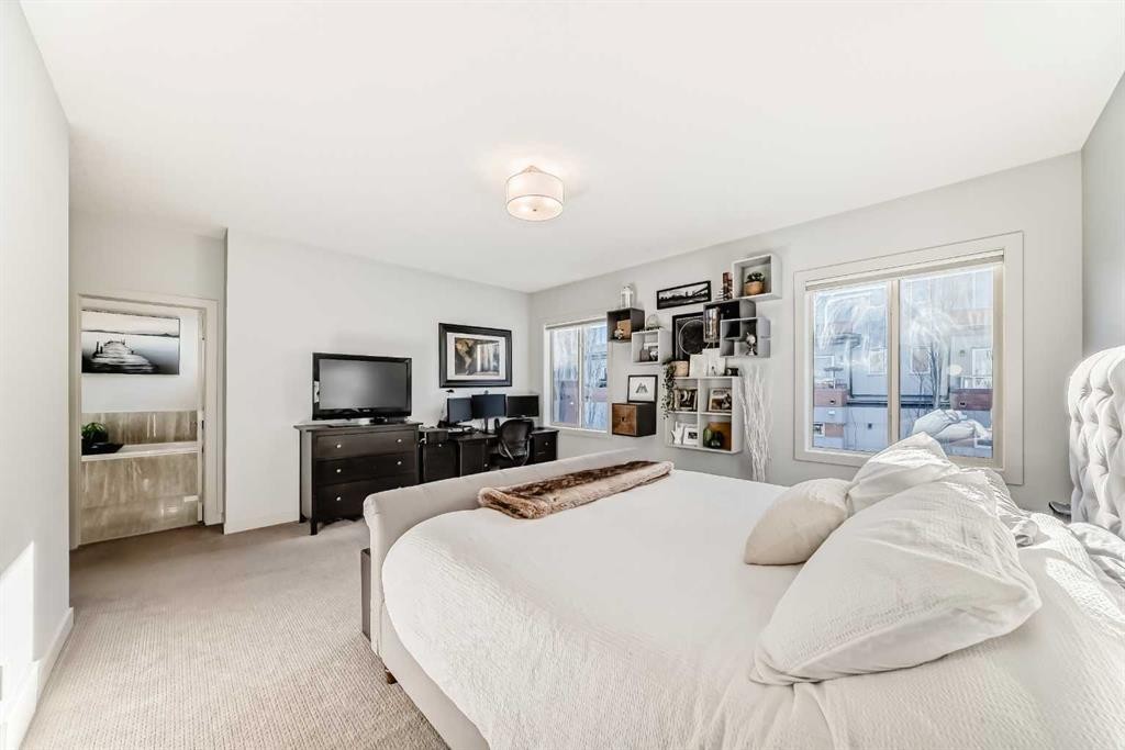 743 Shawnee Drive Sw, Calgary, AB - Indoor Photo Showing Bedroom