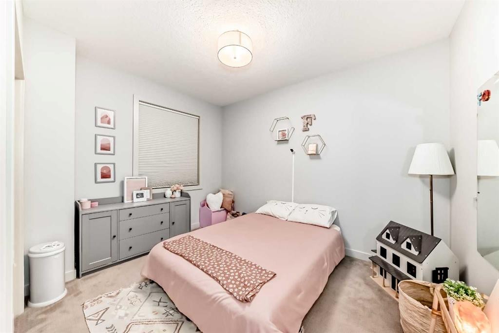 743 Shawnee Drive Sw, Calgary, AB - Indoor Photo Showing Bedroom