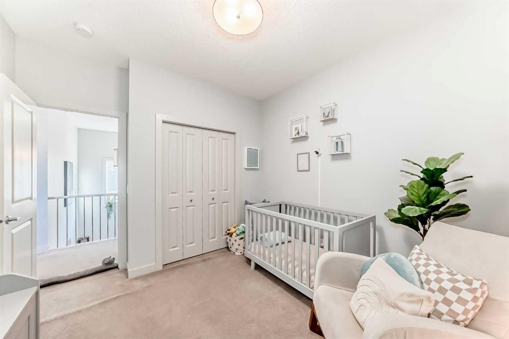 743 Shawnee Drive Sw, Calgary, AB - Indoor Photo Showing Bedroom