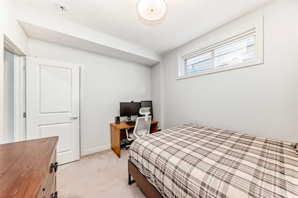 743 Shawnee Drive Sw, Calgary, AB - Indoor Photo Showing Bedroom