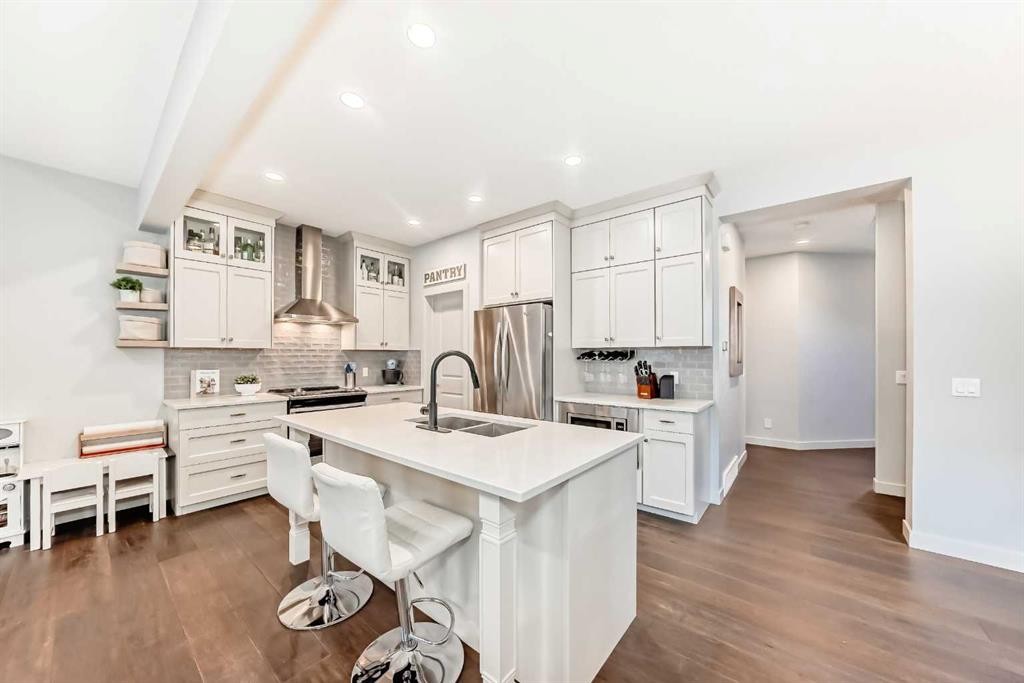743 Shawnee Drive Sw, Calgary, AB - Indoor Photo Showing Kitchen With Double Sink With Upgraded Kitchen