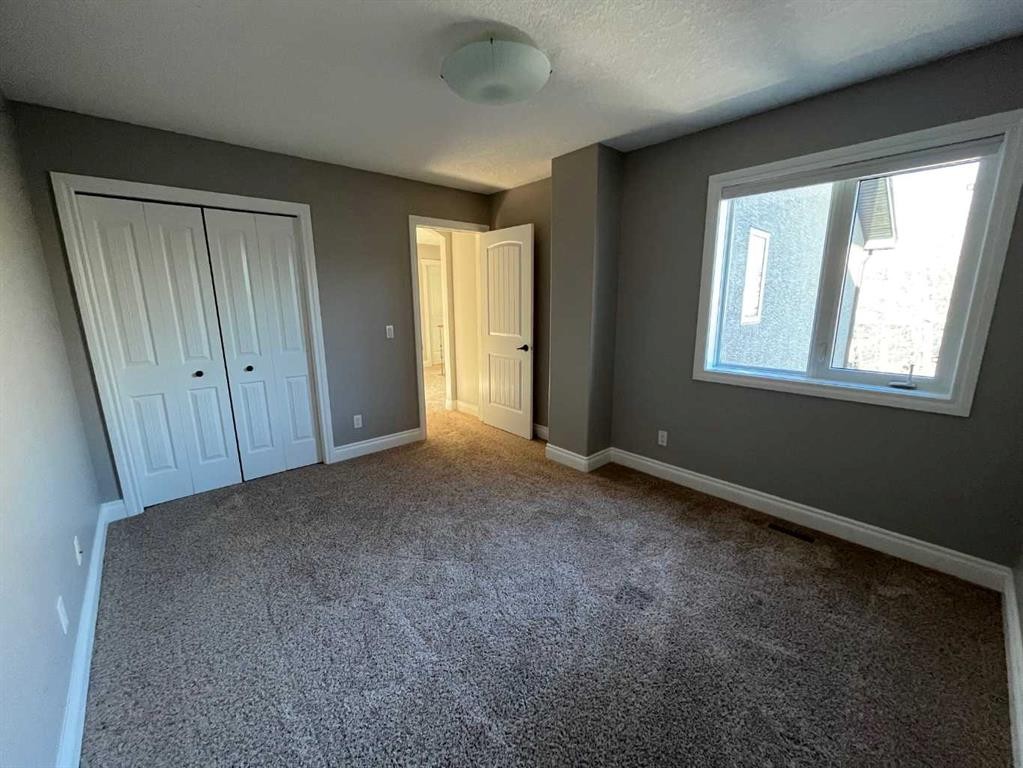 75 Royal Abbey Rise Nw, Calgary, AB - Indoor Photo Showing Other Room