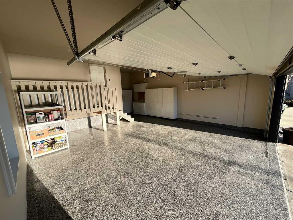 75 Royal Abbey Rise Nw, Calgary, AB - Photo Showing Garage