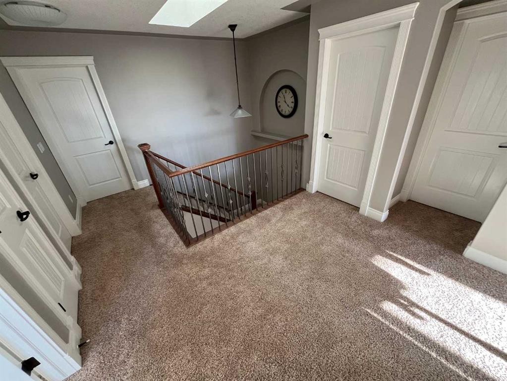 75 Royal Abbey Rise Nw, Calgary, AB - Indoor Photo Showing Other Room