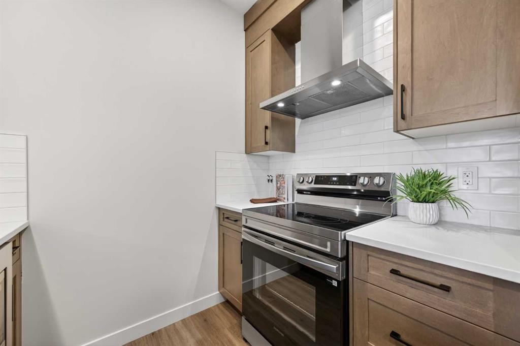 1051 Bayview Crescent, Airdrie, AB - Indoor Photo Showing Kitchen