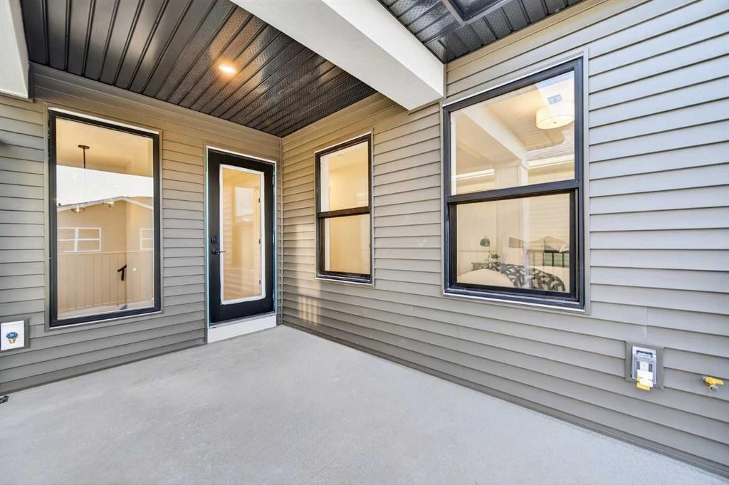 1051 Bayview Crescent, Airdrie, AB - Outdoor With Deck Patio Veranda With Exterior