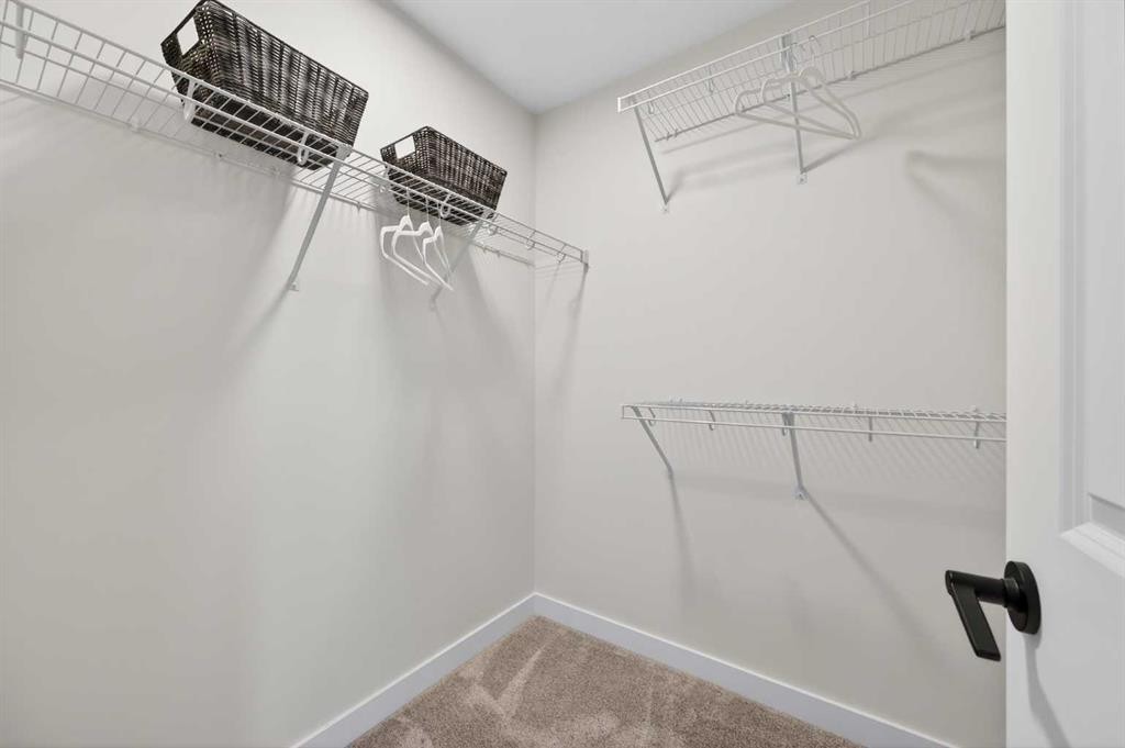1051 Bayview Crescent, Airdrie, AB - Indoor With Storage