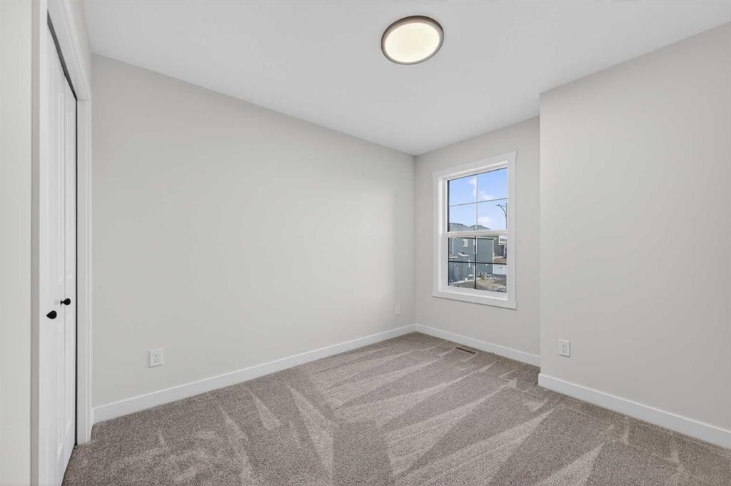 1051 Bayview Crescent, Airdrie, AB - Indoor Photo Showing Other Room