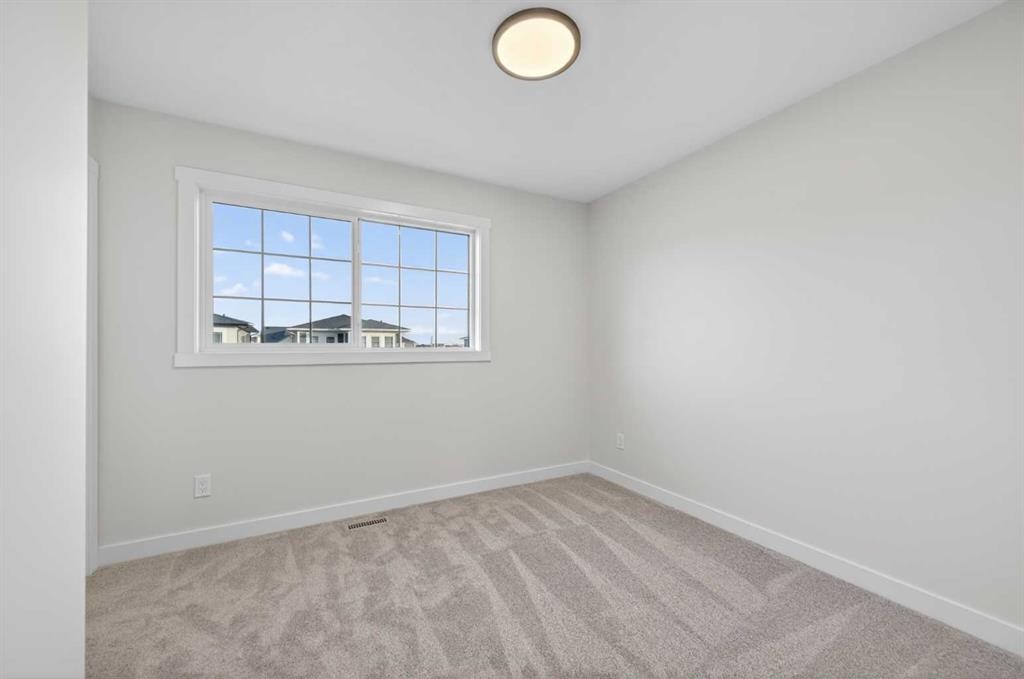 1051 Bayview Crescent, Airdrie, AB - Indoor Photo Showing Other Room