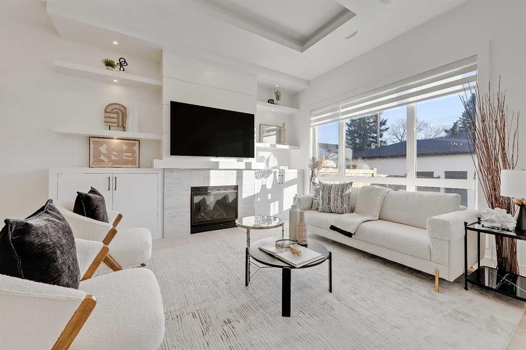 911 22 Avenue Nw, Calgary, AB - Indoor Photo Showing Living Room With Fireplace
