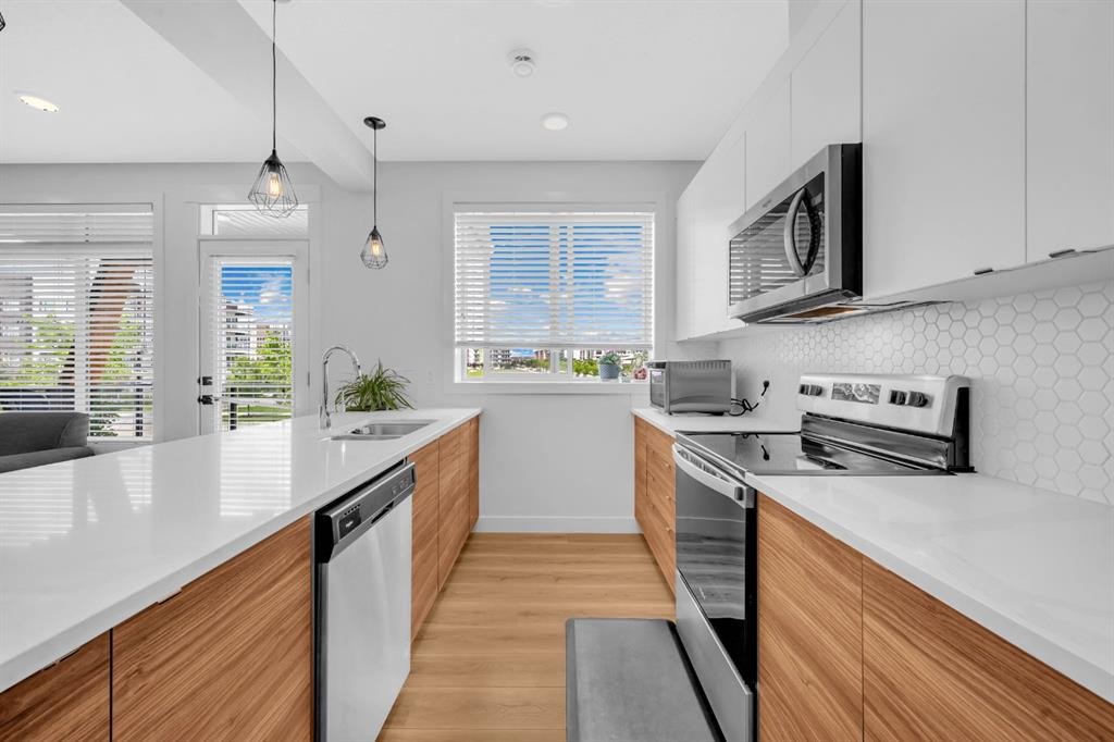 4397 Seton Drive Se, Calgary, AB - Indoor Photo Showing Kitchen With Upgraded Kitchen