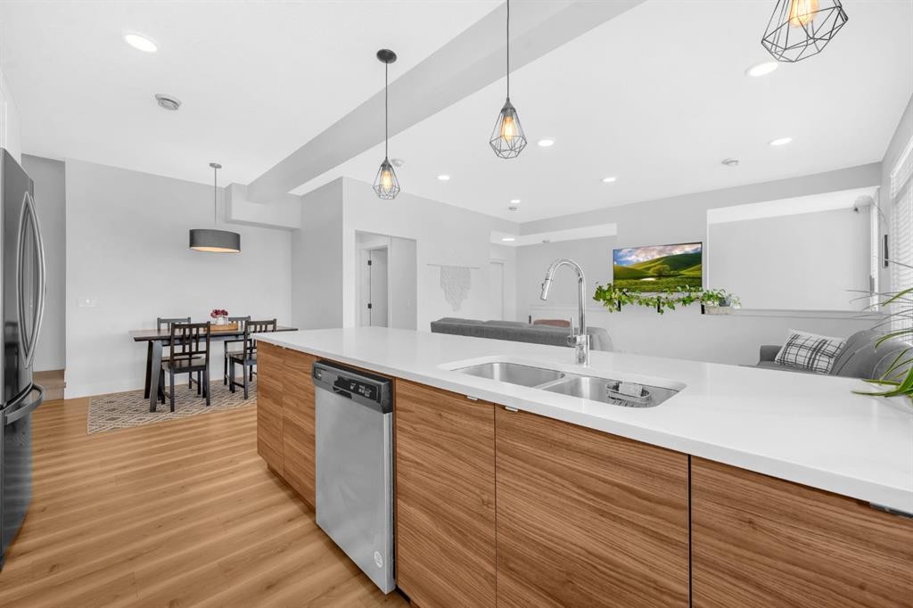 4397 Seton Drive Se, Calgary, AB - Indoor Photo Showing Kitchen With Double Sink