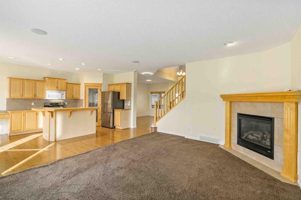153 Kincora Bay Nw, Calgary, AB - Indoor With Fireplace