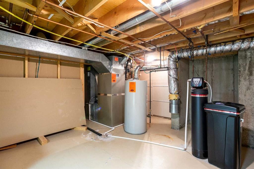 32-275 Woodridge Drive Sw, Calgary, AB - Indoor Photo Showing Basement