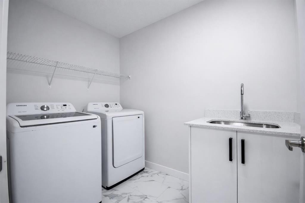 113 Corner Meadows Square Ne, Calgary, AB - Indoor Photo Showing Laundry Room
