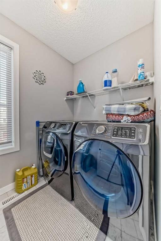 57 Cornerstone Manor Ne, Calgary, AB - Indoor Photo Showing Laundry Room