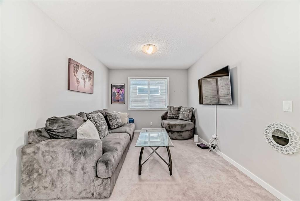57 Cornerstone Manor Ne, Calgary, AB - Indoor Photo Showing Living Room