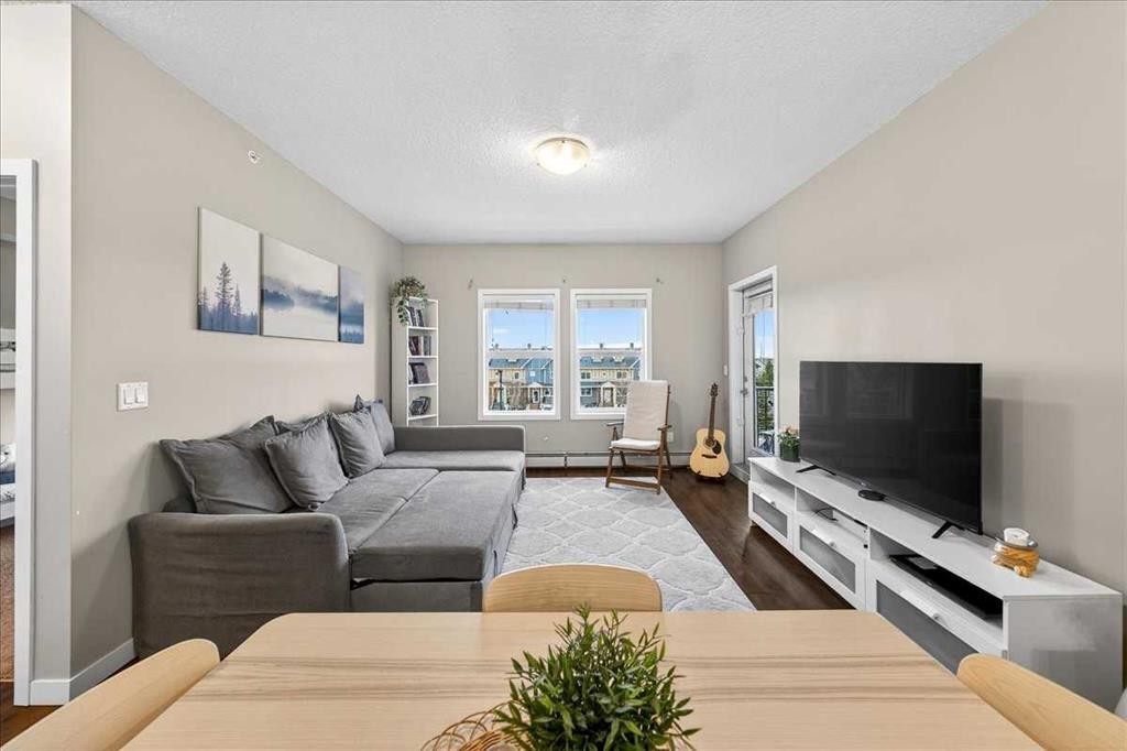 302-200 Cranfield Common Se, Calgary, AB - Indoor Photo Showing Living Room