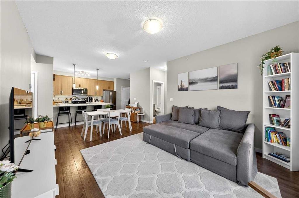 302-200 Cranfield Common Se, Calgary, AB - Indoor Photo Showing Living Room