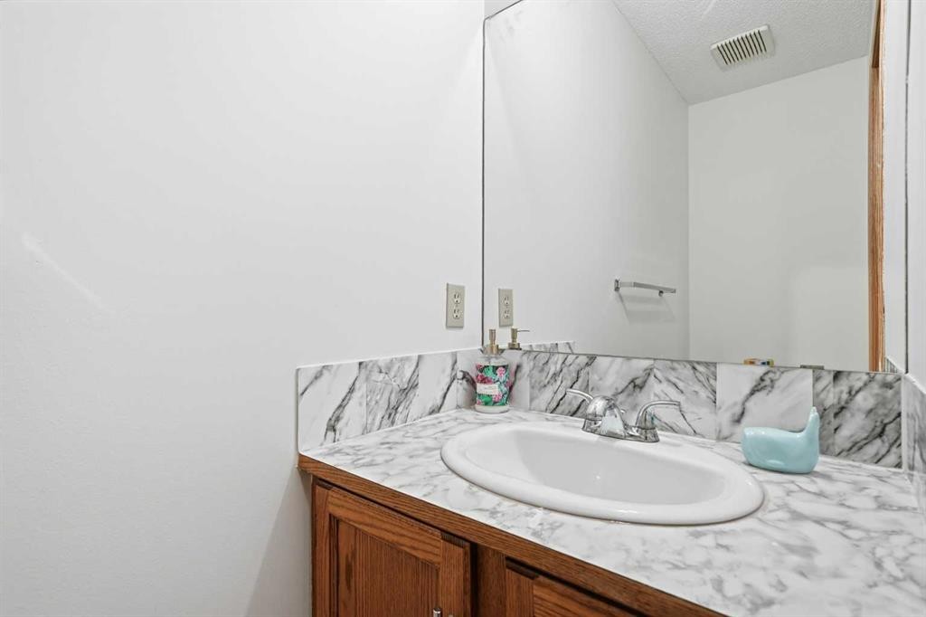24 Laguna Close Ne, Calgary, AB - Indoor Photo Showing Bathroom