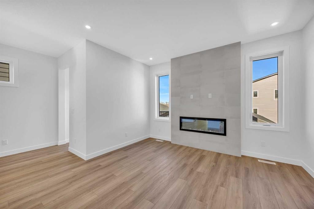 14 Versant Path Sw, Calgary, AB - Indoor With Fireplace