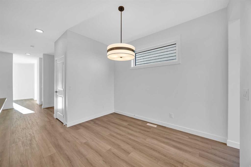 14 Versant Path Sw, Calgary, AB - Indoor Photo Showing Other Room