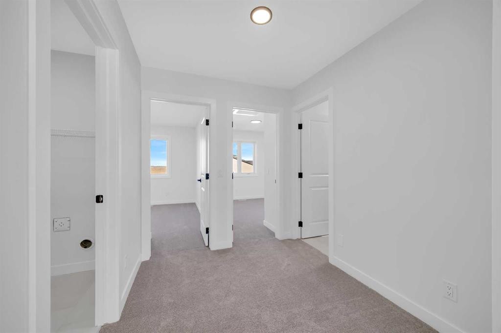 14 Versant Path Sw, Calgary, AB - Indoor Photo Showing Other Room