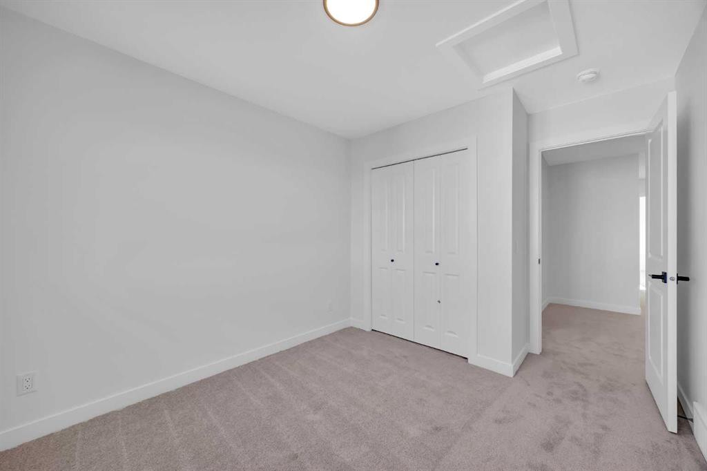 14 Versant Path Sw, Calgary, AB - Indoor Photo Showing Other Room